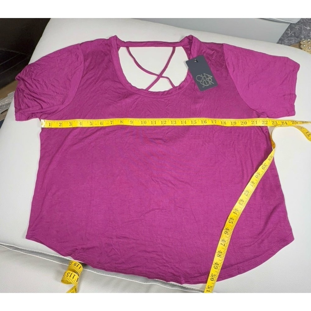 Women's size 1X mulberry or magenta Chaser brand top features a crisscross strap